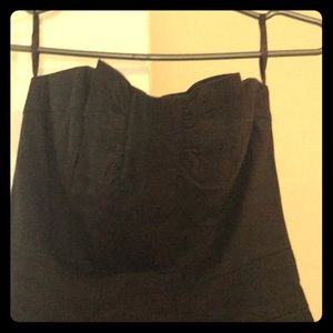 Strapless black dress with bow.